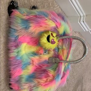 Justice rainbow rolling bag